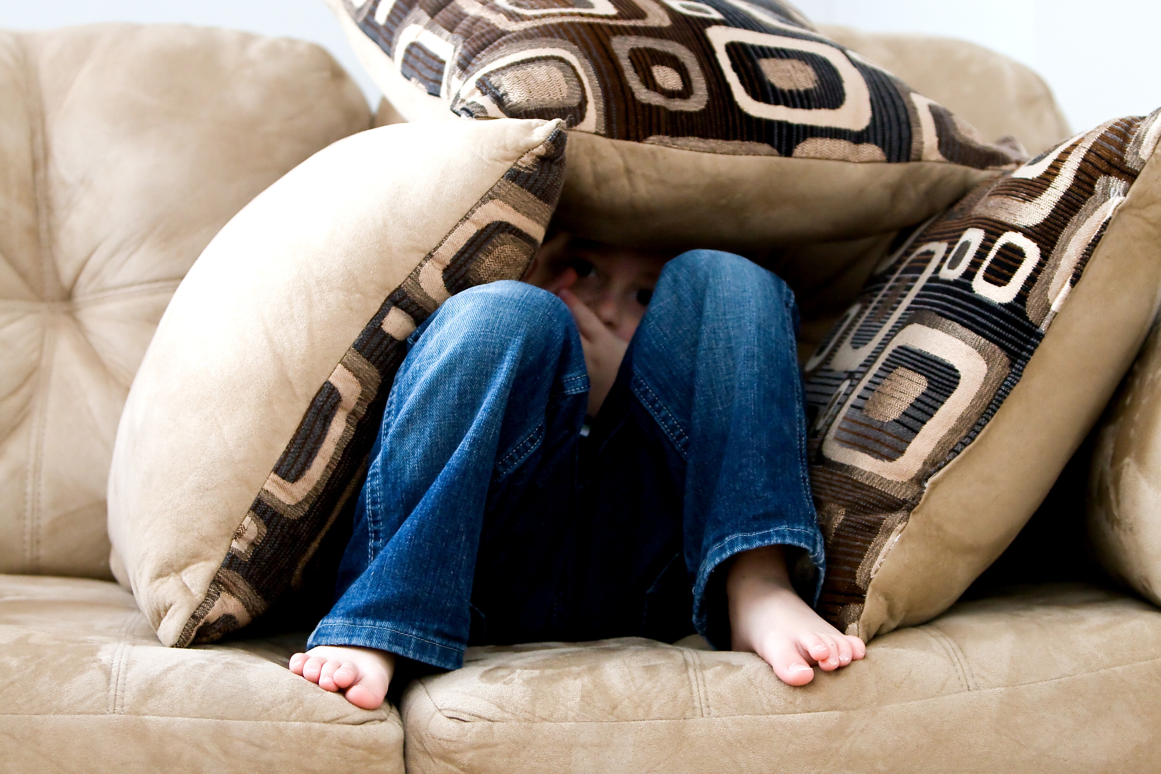 Williamsburg Therapy Group, Child on couch hiding under pillow